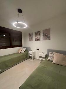 Postel nebo postele na pokoji v ubytování Apartment Los Balcones - Torrevieja