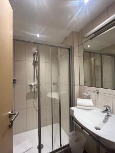Koupelna v ubytování Hotel Casada - inklusive Sommer Card