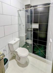 a bathroom with a toilet and a shower at 402PP Nuevo y Moderno in Vallecito +12 photos