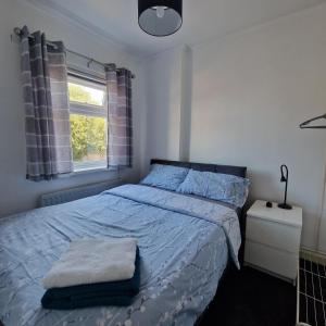 Ένα ή περισσότερα κρεβάτια σε δωμάτιο στο Belfast City house