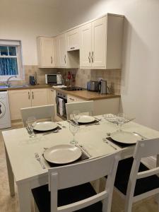 Køkken eller tekøkken på Elmwood Cottage