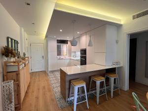 Kuchyňa alebo kuchynka v ubytovaní Sanlúcar Bajo de Guía PG Apartamentos