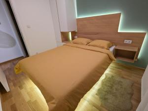 Letto o letti in una camera di Teo Divčigora