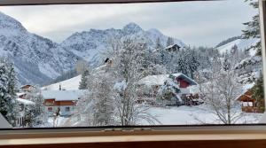 Nespecifikovaný výhled na hory nebo výhled na hory při pohledu z apartmánu