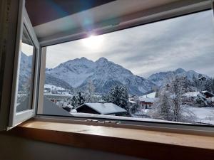 Nespecifikovaný výhled na hory nebo výhled na hory při pohledu z apartmánu