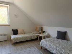 Letto o letti in una camera di Kuća za odmor Kekec Fruška gora
