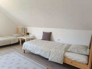 Letto o letti in una camera di Kuća za odmor Kekec Fruška gora