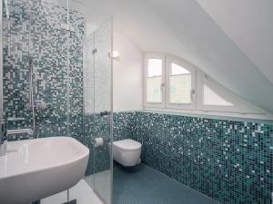 Ein Badezimmer in der Unterkunft Haus SEEGARTEN