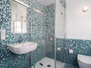 Ein Badezimmer in der Unterkunft Haus SEEGARTEN