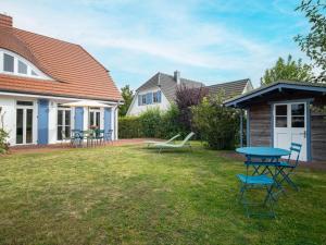 Ein Garten an der Unterkunft Haus SEEGARTEN