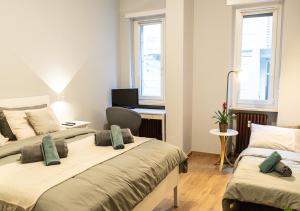 Postel nebo postele na pokoji v ubytování Vittoria House Turin I - Appartamento al Valentino centro Torino