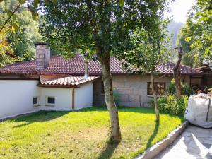 Vườn quanh Abrigo do verao Maison près du lac +7 ảnh
