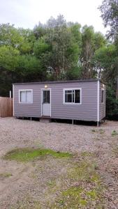 a small house is parked in a yard at Casa de playa océan park in Sauce de Portezuelo