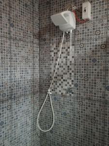 Ένα μπάνιο στο Pousada ideal -casa 3 nos fundos