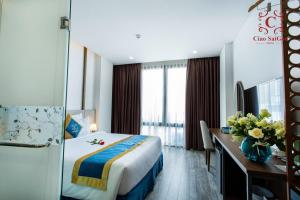 Postel nebo postele na pokoji v ubytování Ciao Saigon 2 Hotel