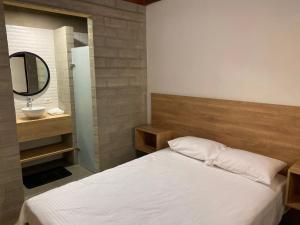 Postel nebo postele na pokoji v ubytování Hospedaje San Diego