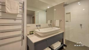 Vannituba majutusasutuses Ski In Ski Out 11 +9 fotot