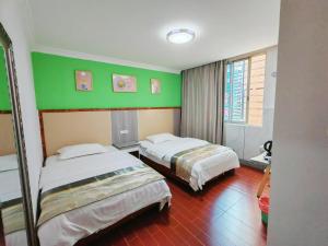 Katil atau katil-katil dalam bilik di Dihao Hostel North Railway Station