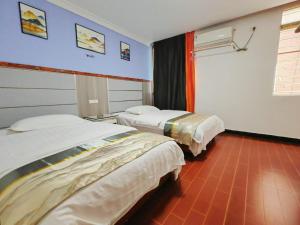 Katil atau katil-katil dalam bilik di Dihao Hostel North Railway Station