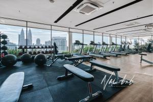 Fitness centrum a/nebo fitness zařízení v ubytování NaiBnB in The Colony by Infinitum