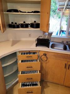 a kitchen with a counter with boxes on it at House on Avenue of the Giants, Miranda, California in Miranda