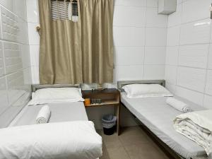 Voodi või voodid majutusasutuse Hollywood guesthouse toas