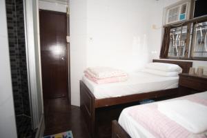 Voodi või voodid majutusasutuse Hollywood guesthouse toas