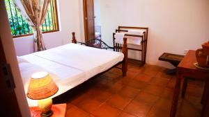 Postel nebo postele na pokoji v ubytování Breez Holiday Home