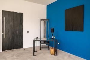 Μια τηλεόραση ή/και κέντρο ψυχαγωγίας στο Rouge - Loft Noon