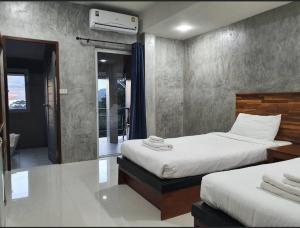 Postel nebo postele na pokoji v ubytování Life koh tao resort