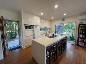 Kuchyň nebo kuchyňský kout v ubytování Pandanus + 7 fotografií