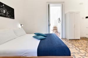 Postel nebo postele na pokoji v ubytování Liberty Rooms