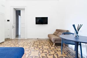 TV a/nebo společenská místnost v ubytování Liberty Rooms