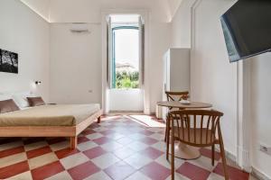 TV a/nebo společenská místnost v ubytování Liberty Rooms