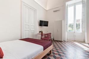 Postel nebo postele na pokoji v ubytování Liberty Rooms