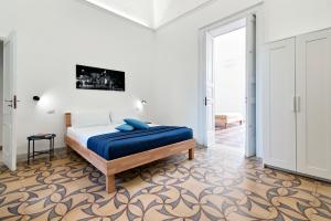 Postel nebo postele na pokoji v ubytování Liberty Rooms