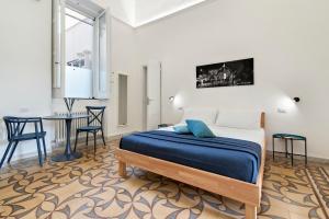 Postel nebo postele na pokoji v ubytování Liberty Rooms
