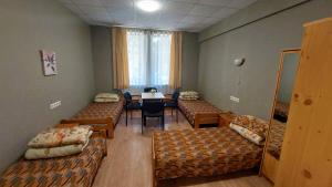 Postel nebo postele na pokoji v ubytování Happy Hostel