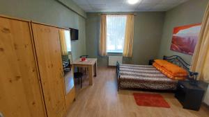 Postel nebo postele na pokoji v ubytování Happy Hostel