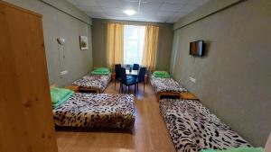 Postel nebo postele na pokoji v ubytování Happy Hostel