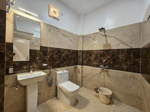 חדר רחצה ב-Hotel Rishiraj