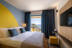 Postel nebo postele na pokoji v ubytování Sunny Krk by Valamar