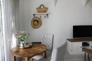 TV a/nebo společenská místnost v ubytování Casa Fiore