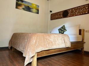 Postel nebo postele na pokoji v ubytování Coral Choice