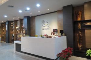 Fuajee või vastuvõtt majutusasutuses Garden Business Hotel