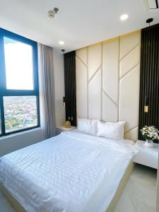 Postel nebo postele na pokoji v ubytování LaLa Apartment 2