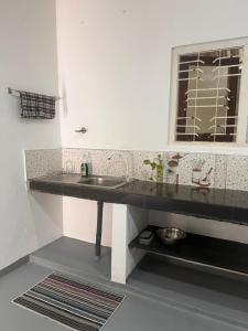 Afbeelding uit fotogalerij van The Drop In Madiha I A/C Suite in Madihe East