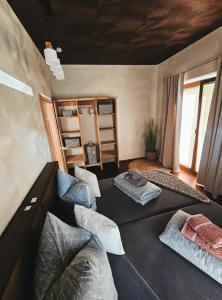 a room with two beds and pillows in a room at Ferienwohnungen & Landlust Fulda in Petersberg