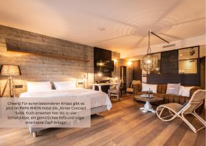 Postel nebo postele na pokoji v ubytování PAPA RHEIN - Hotel & Spa