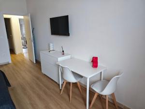 TV a/nebo společenská místnost v ubytování Appartamento Sogni d'Itria